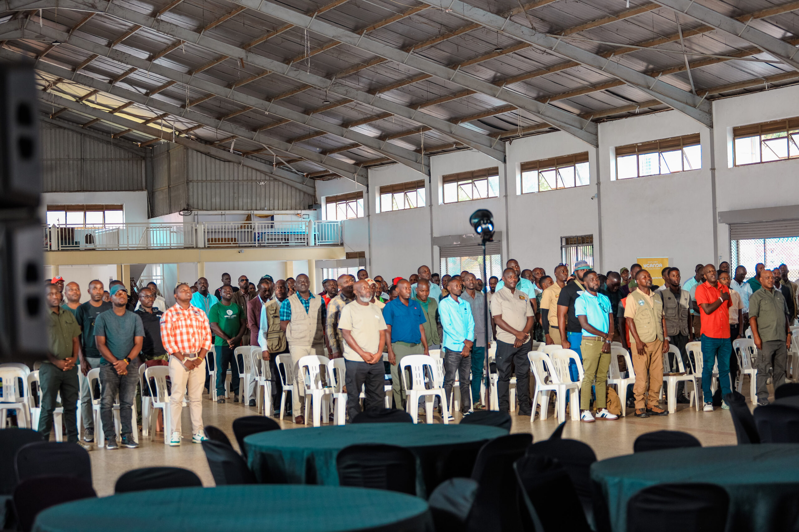 Tour guides standing up and the Annual Tourist Conference